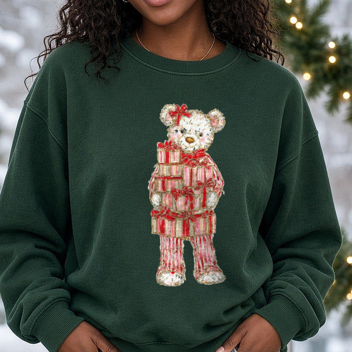 Christmas Teddy Bear Bow Stack Of Gifts DTF transfer shown on a Comfort Colors sweatshirt