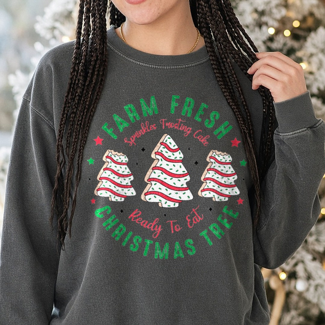 Farm Fresh Christmas Tree Cakes DTF transfer shown on a Comfort Colors sweatshirt