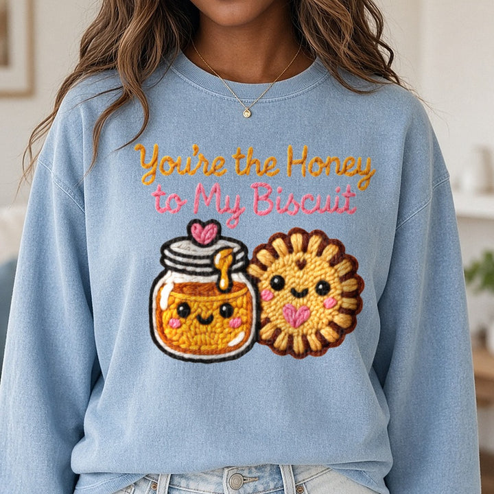 Latch Hook Funny Food Honey to my Biscuit DTF transfer shown on a Comfort Colors sweatshirt