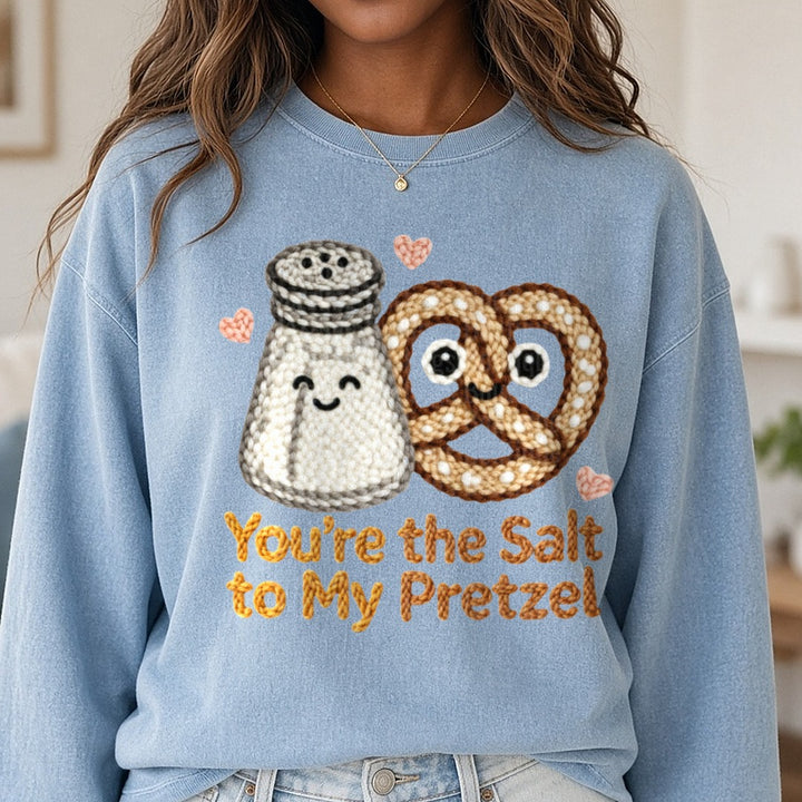 Latch Hook Funny Food Salt to my Pretzel DTF transfer shown on a Comfort Colors sweatshirt