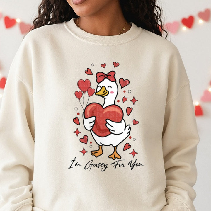 Cute Lovely Goose Coquette Duck Valentine DTF transfer shown on a Comfort Colors sweatshirt