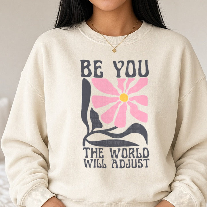 Be You the World Will Adjust Back DTF transfer shown on a Comfort Colors sweatshirt