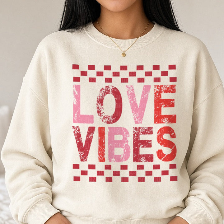 Love Vibes Retro Check Valentines Day DTF transfer shown on a Comfort Colors sweatshirt