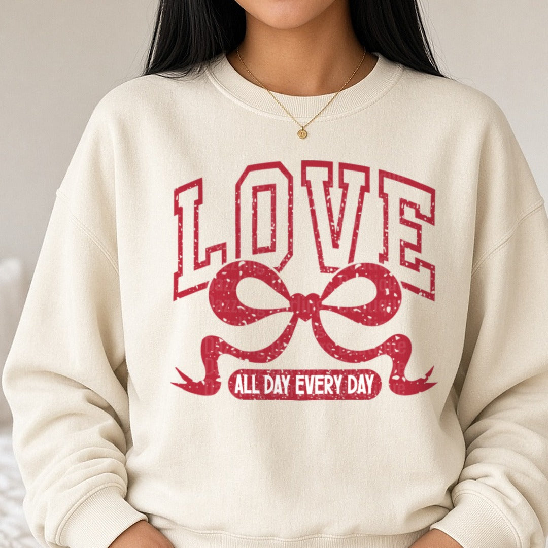 Love Coquette Bow Valentines Day DTF transfer shown on a Comfort Colors sweatshirt