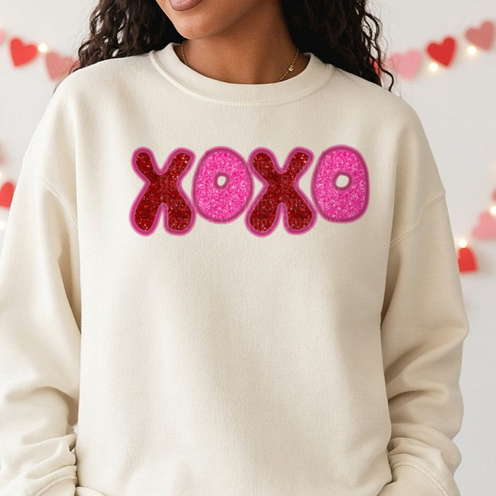 Xoxo Valentines Day DTF transfer shown on a Comfort Colors sweatshirt