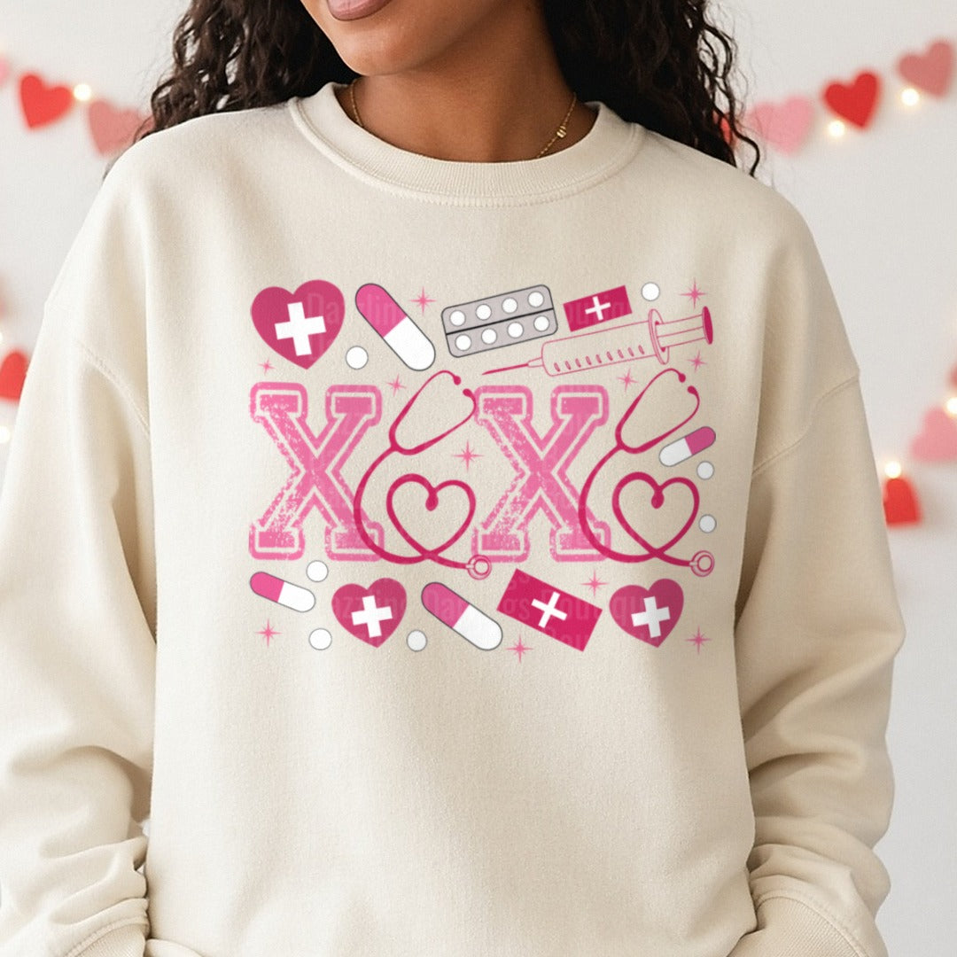 XOXO Valentines Day Nurse Stethoscope Medical Icons DTF transfer shown on a Comfort Colors sweatshirt