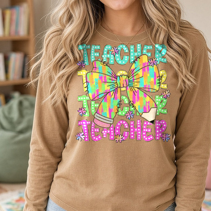 100 Days Of School Teacher Repeat Neon Coquette Bow DTF transfer shown on a Comfort Colors long sleeve tee