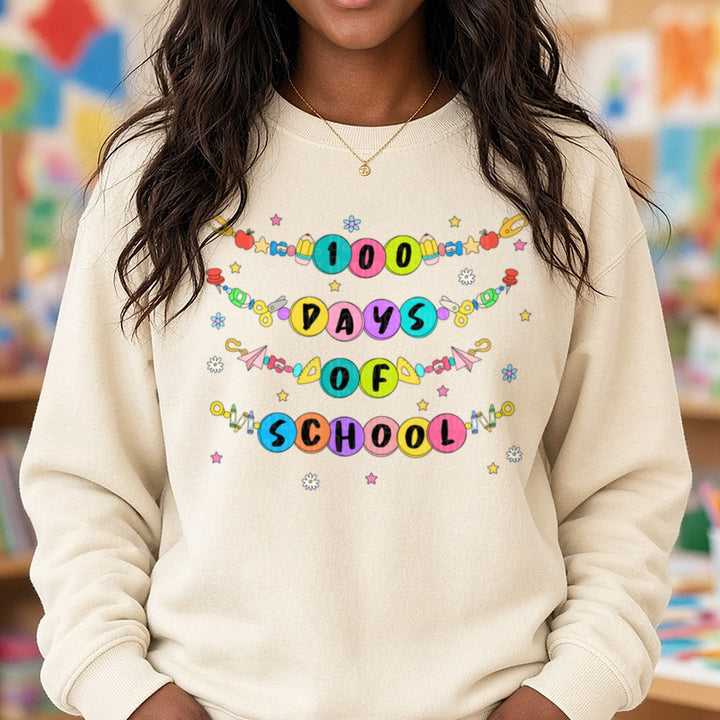 100 Days of School DTF transfer shown on a Comfort Colors sweatshirt