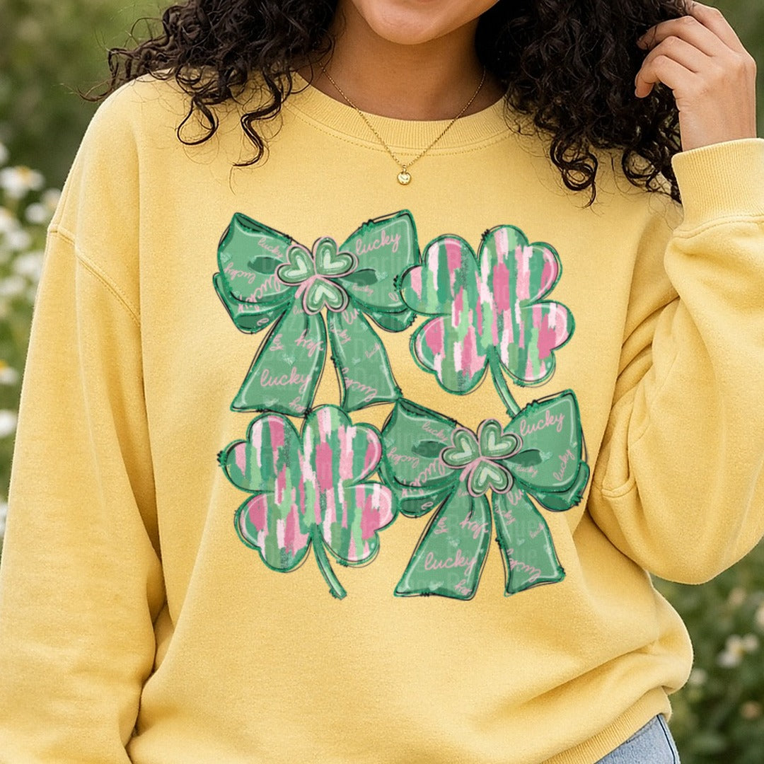 Shamrock and Bows St Patrick's Day DTF transfer shown on a Comfort Colors sweatshirt