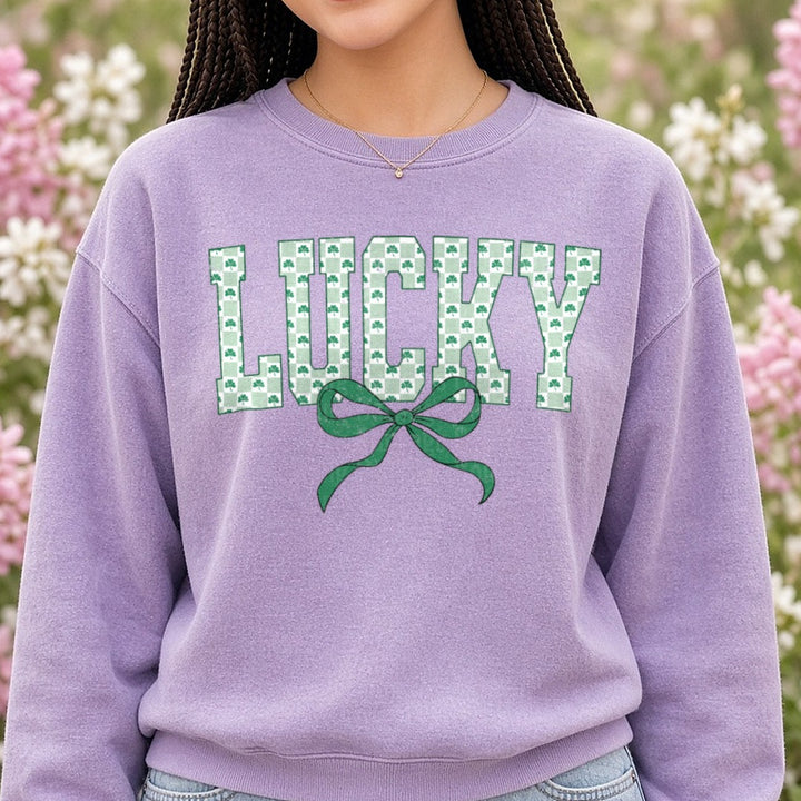 Lucky Coquette Bow St Patrick's Day DTF transfer shown on a Comfort Colors sweatshirt
