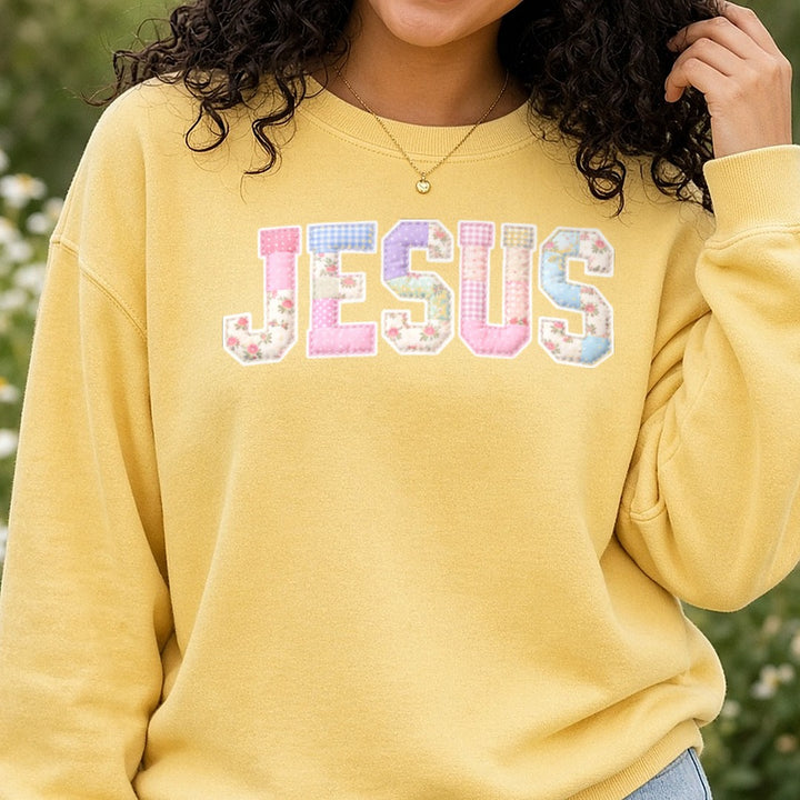 Pink Patchwork Jesus Easter DTF transfer shown on a Comfort Colors sweatshirt