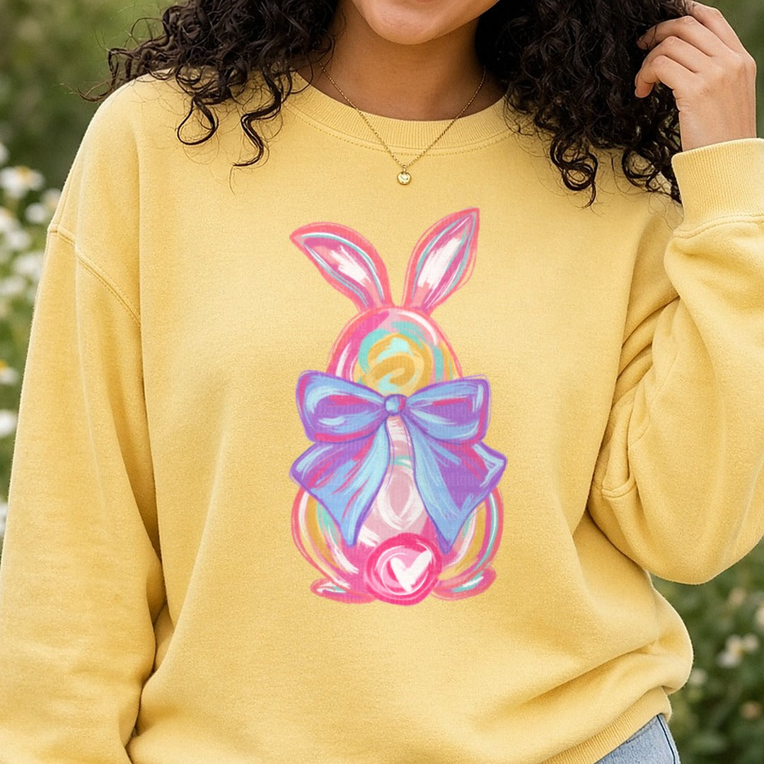 Watercolor Brush Strokes Easter Bunny DTF transfer shown on a Comfort Colors sweatshirt