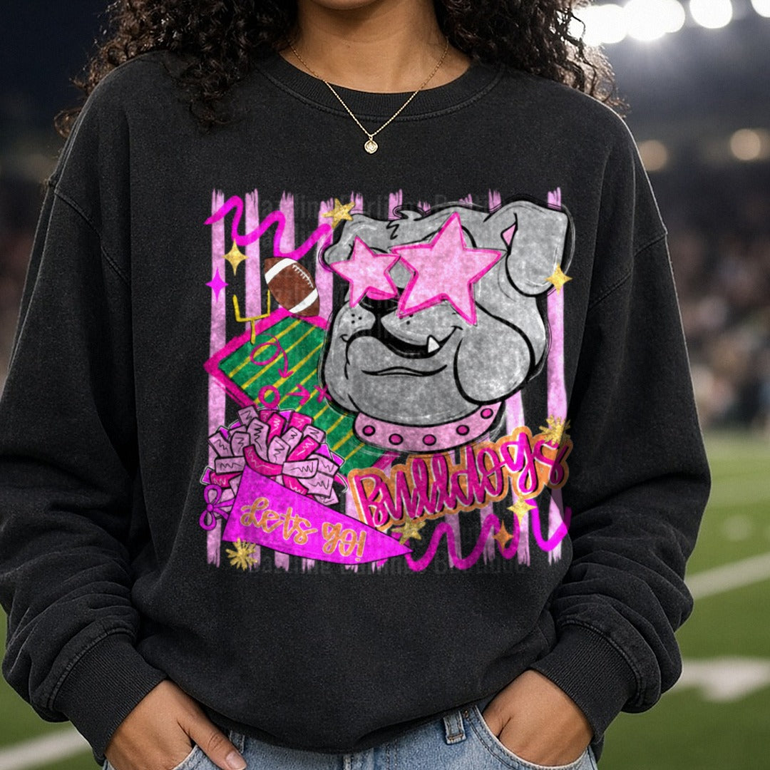 My Bulldogs Lets Go Football Design with Pink Stars and Pom Poms DTF transfer shown on a Comfort Colors sweatshirt