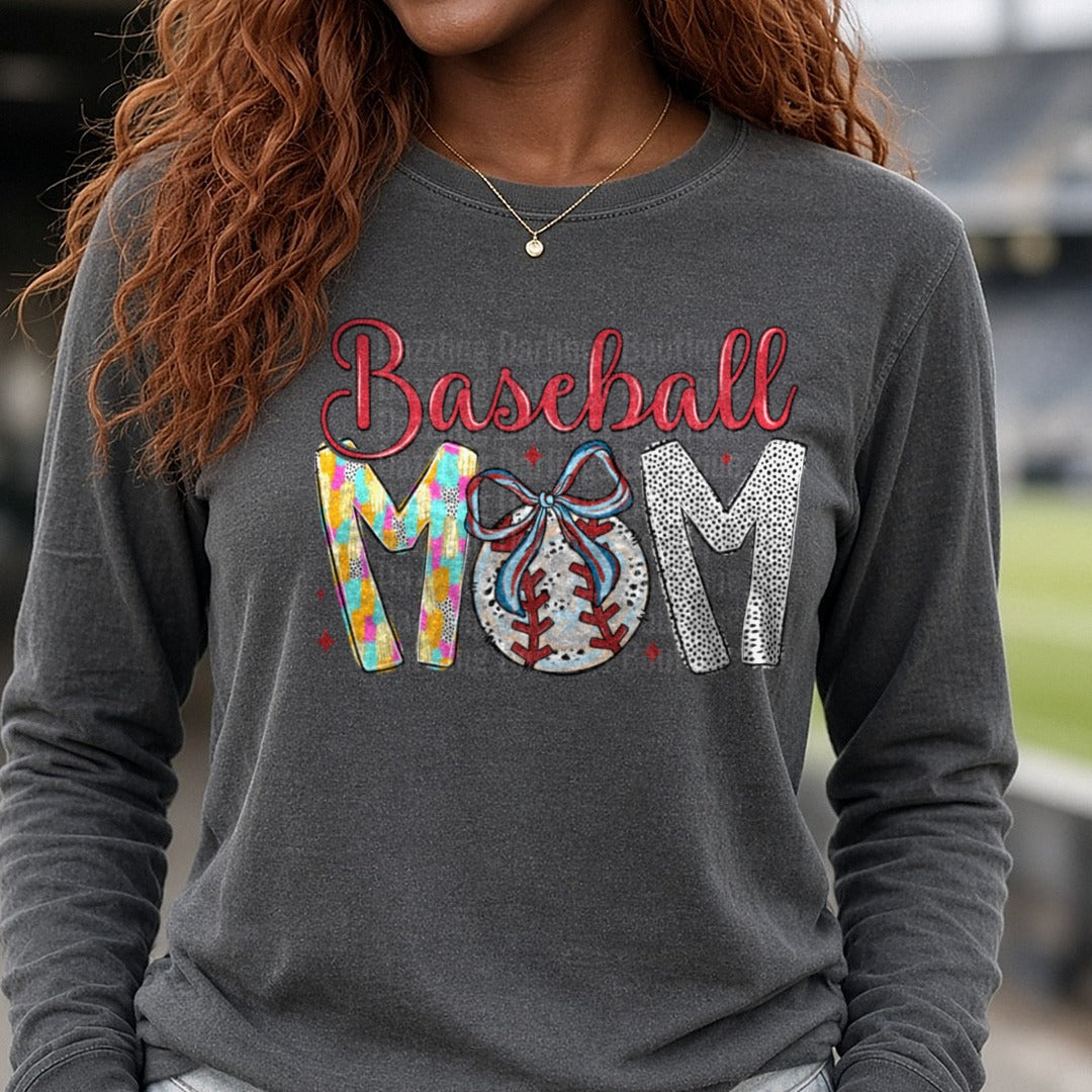 Baseball MOM with Colorful Letters and Bow Ribbon Design DTF transfer shown on a Comfort Colors long sleeve tee