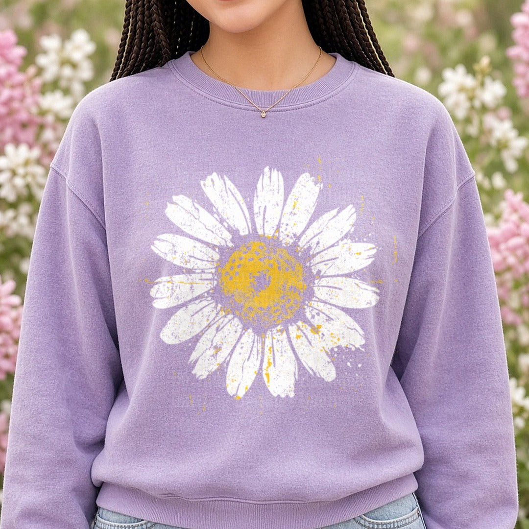 Distressed Yellow Grunge Daisy with Paint Splatter Effects DTF transfer shown on a Comfort Colors sweatshirt
