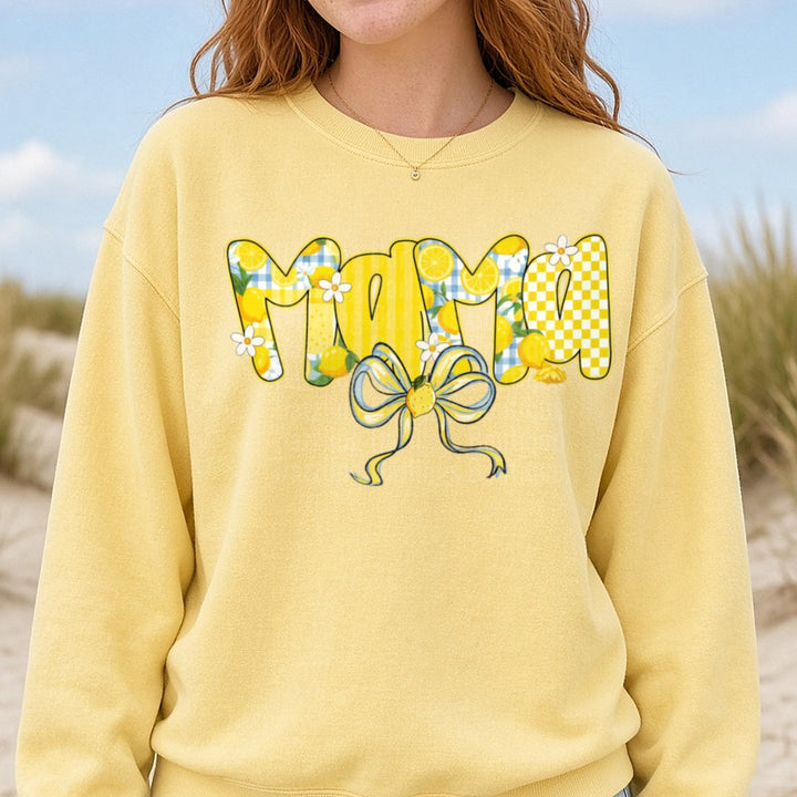 Mama Lemon Pattern Letters with Blue Gingham and Bow DTF transfer shown on a Comfort Colors sweatshirt