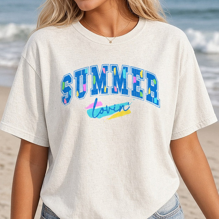 Summer Lovin Paint Splash Typography Design DTF transfer shown on a Comfort Colors tee