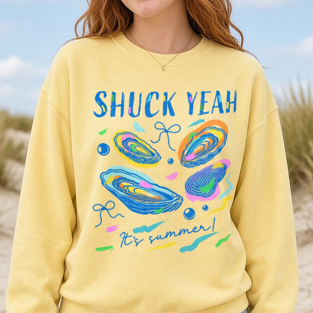 Shuck Yeah It's Summer Colorful Oyster Shells Design DTF transfer shown on a Comfort Colors sweatshirt