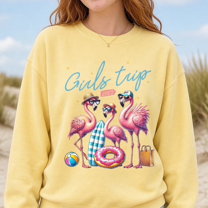 Girls Trip 2025 Flamingos with Sunglasses Beach Vacation DTF transfer shown on a Comfort Colors sweatshirt