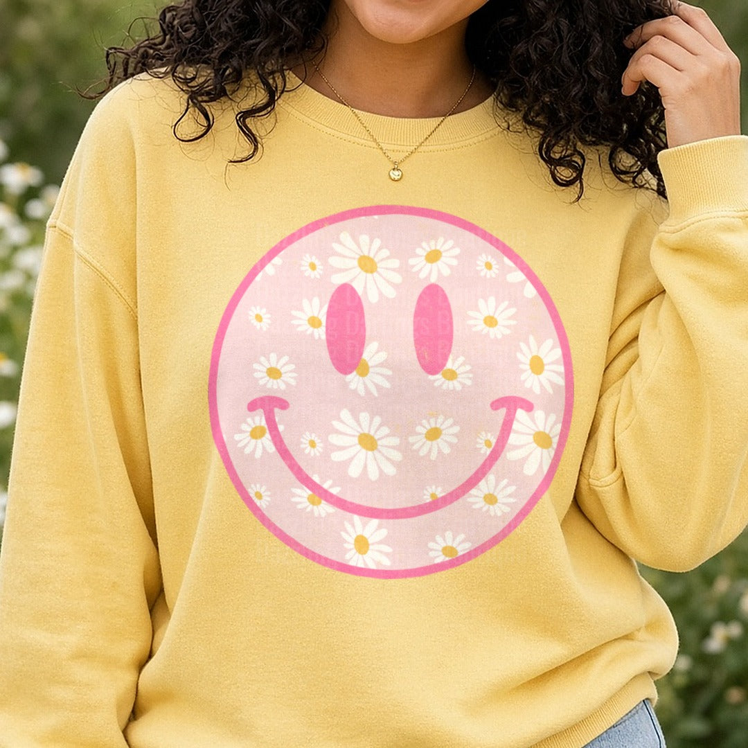 Pink Daisy Flower Smiley Face Circle Design DTF transfer shown on a Comfort Colors sweatshirt