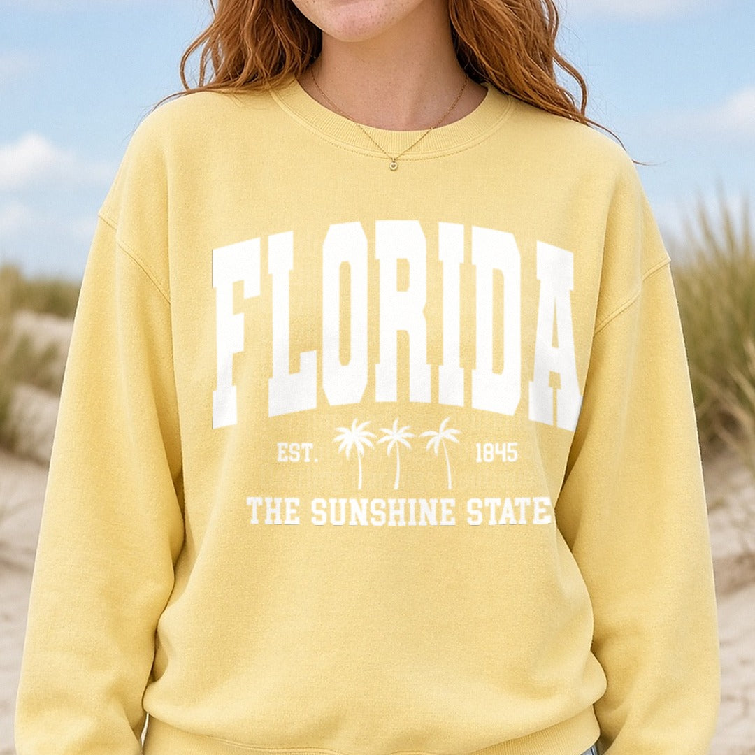 Florida white Est 1845 The Sunshine State Palm Trees Design DTF transfer shown on a Comfort Colors sweatshirt