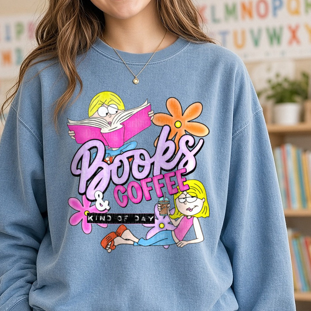 Books and Coffee Kind of Day Blonde Girl Reading Design DTF transfer shown on a Comfort Colors sweatshirt