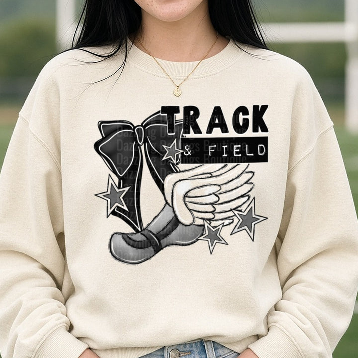 Track and Field Running Shoe with Wings and Stars Design DTF transfer shown on a Comfort Colors sweatshirt