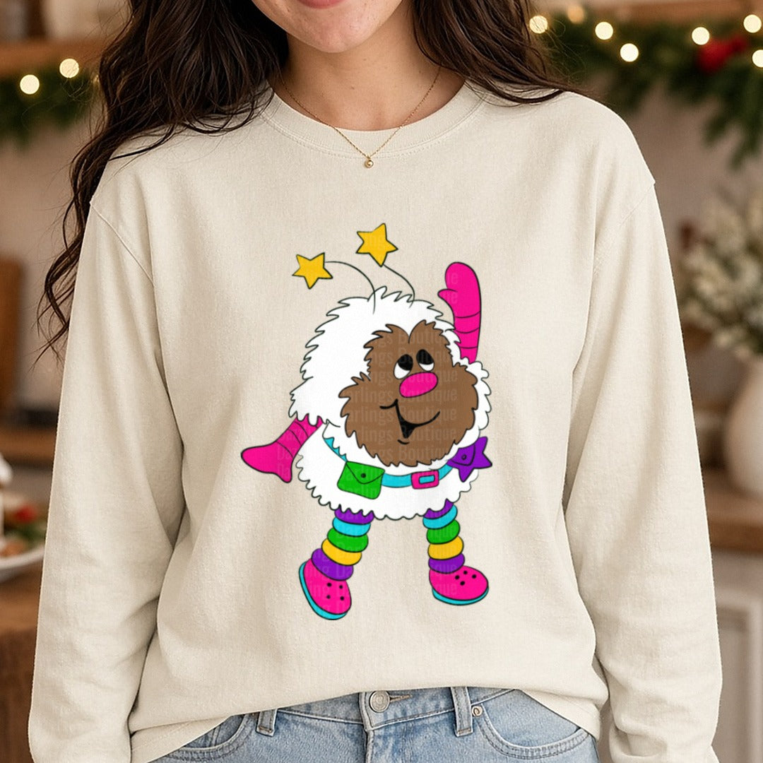 Colorful Winter Gnome with Stars and Fluffy Beard DTF transfer shown on a Comfort Colors long sleeve tee