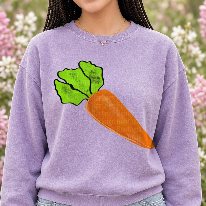 Orange Carrot with Green Leafy Top Vegetable Design DTF transfer shown on a Comfort Colors sweatshirt