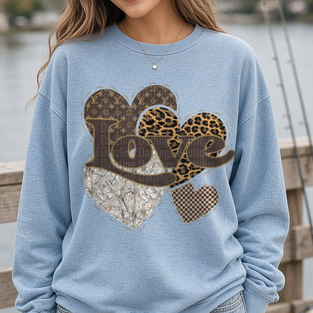 Love Hearts with LV Leopard Print and Camo Patterns DTF transfer shown on a Comfort Colors sweatshirt