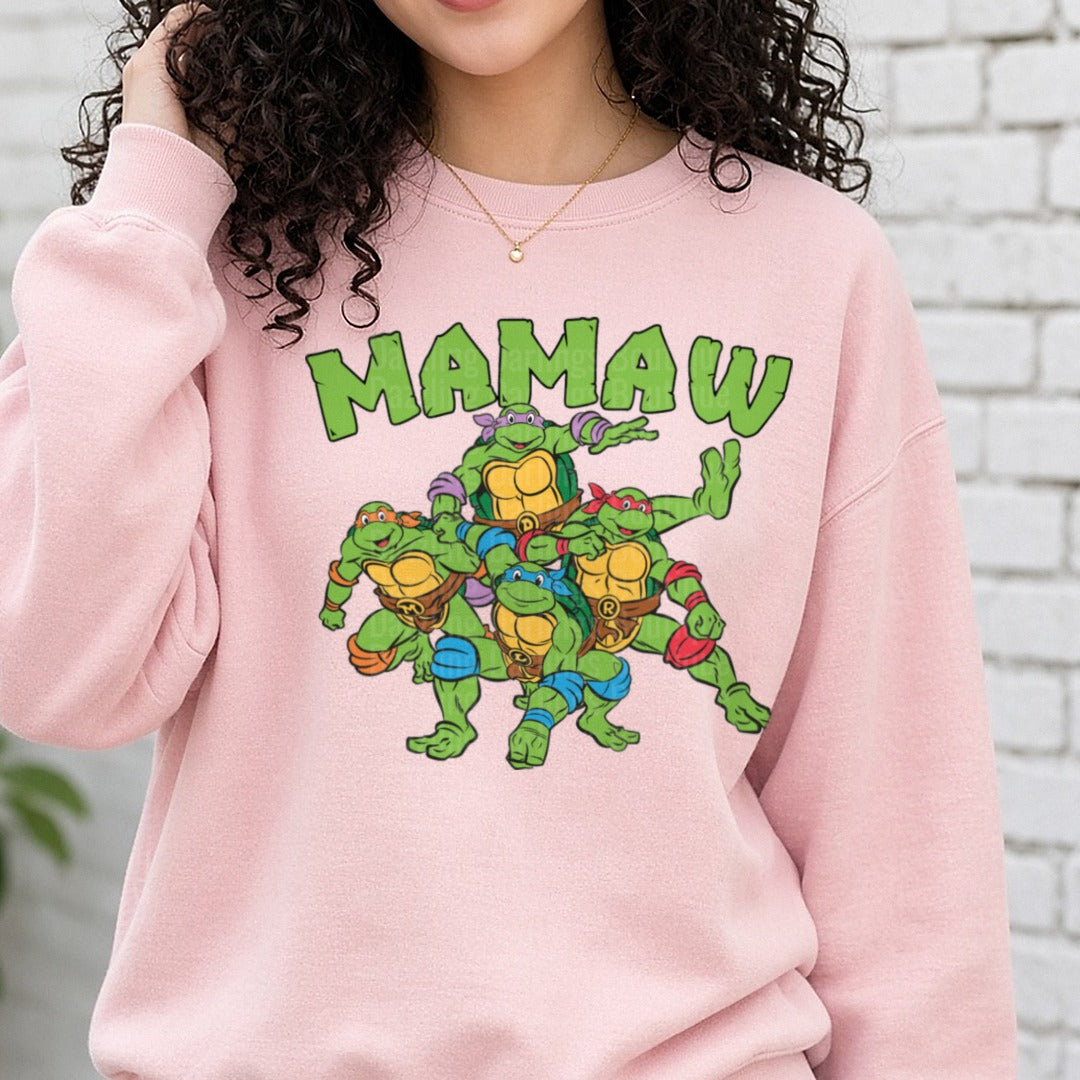 MAMA VI Teenage Mutant Ninja Turtles Group Design DTF transfer shown on a Comfort Colors sweatshirt
