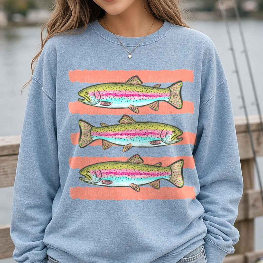 Colorful Rainbow Trout Fish on Coral Striped Background DTF transfer shown on a Comfort Colors sweatshirt