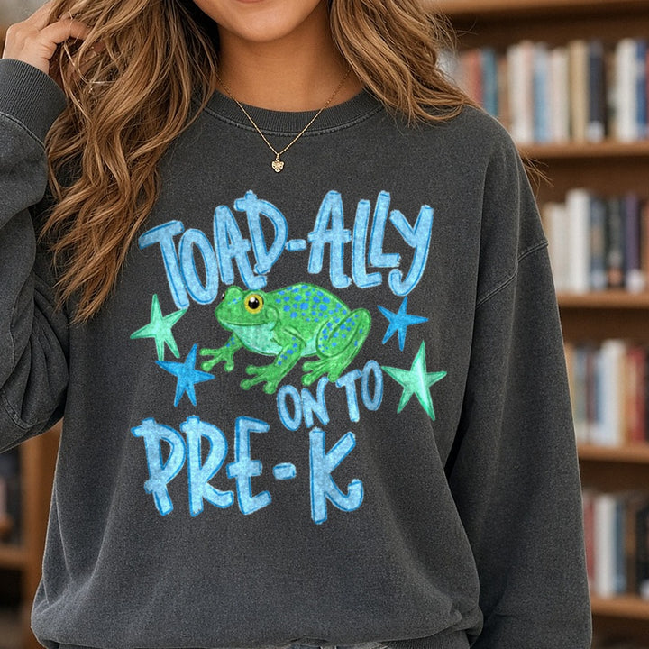 Toad-ally Onto Pre-K Cute Frog Back to School Design DTF transfer shown on a Comfort Colors sweatshirt