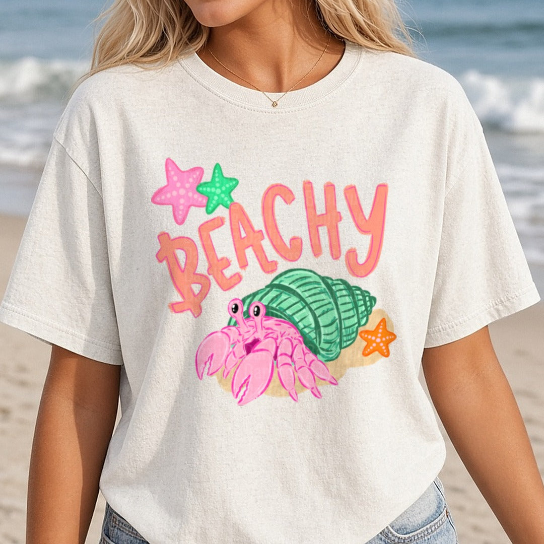 Beachy Pink Hermit Crab with Starfish Summer Design DTF transfer shown on a Comfort Colors tee