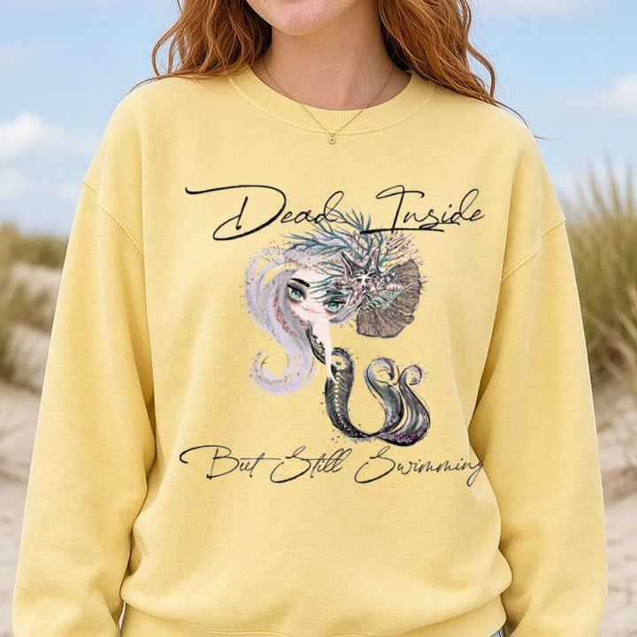 Dead Inside But Still Swimming Mermaid with Sea Life Crown DTF transfer shown on a Comfort Colors sweatshirt