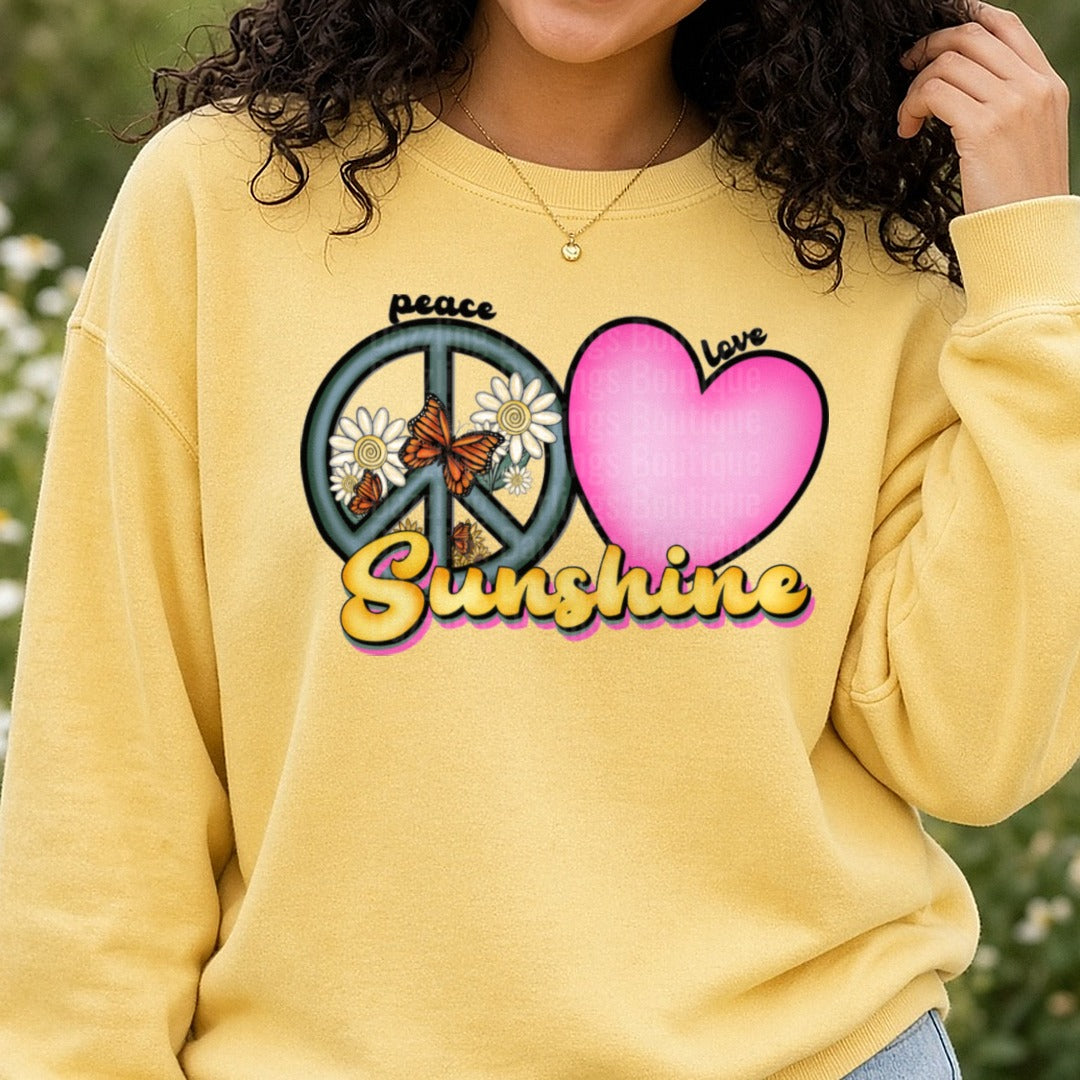 Peace Love Sunshine Hippie Design with Monarch Butterflies and Daisies DTF transfer shown on a Comfort Colors sweatshirt