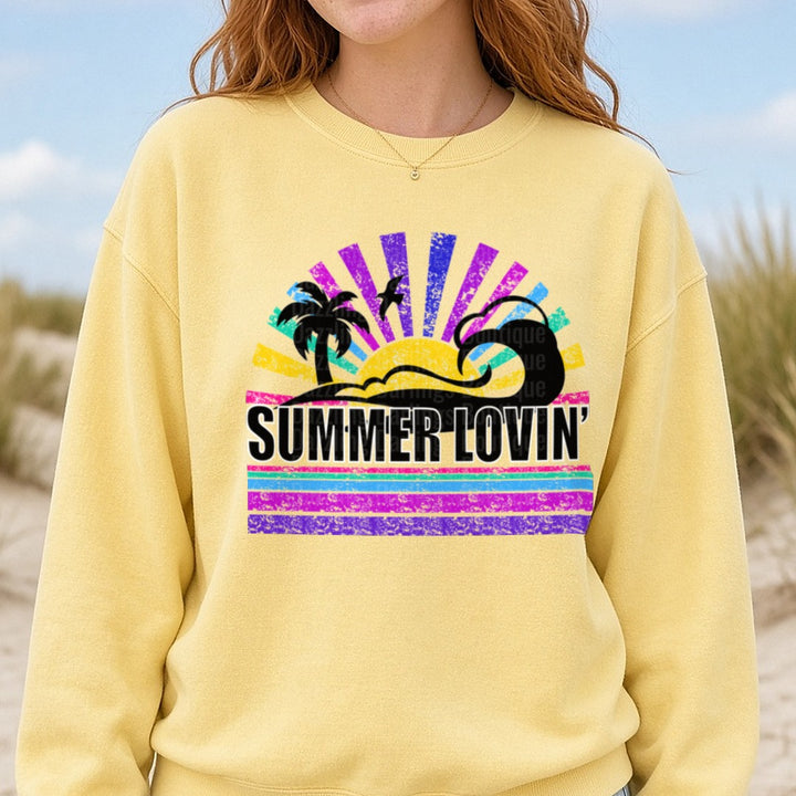 Summer Lovin' Retro Sunset Palm Tree Beach Vibes DTF transfer shown on a Comfort Colors sweatshirt