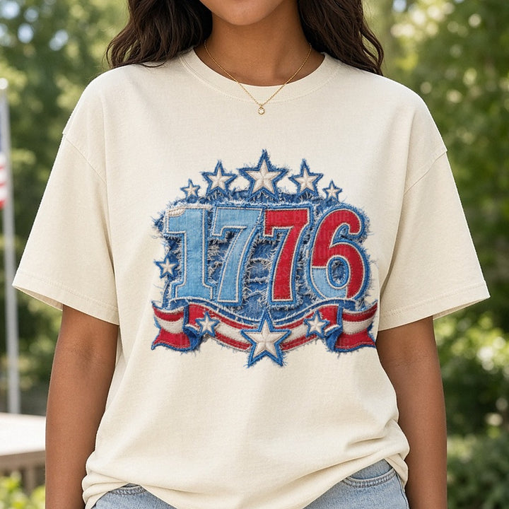 Vintage Distressed 1776 Patriotic Stars and Stripes Design DTF transfer shown on a Comfort Colors tee