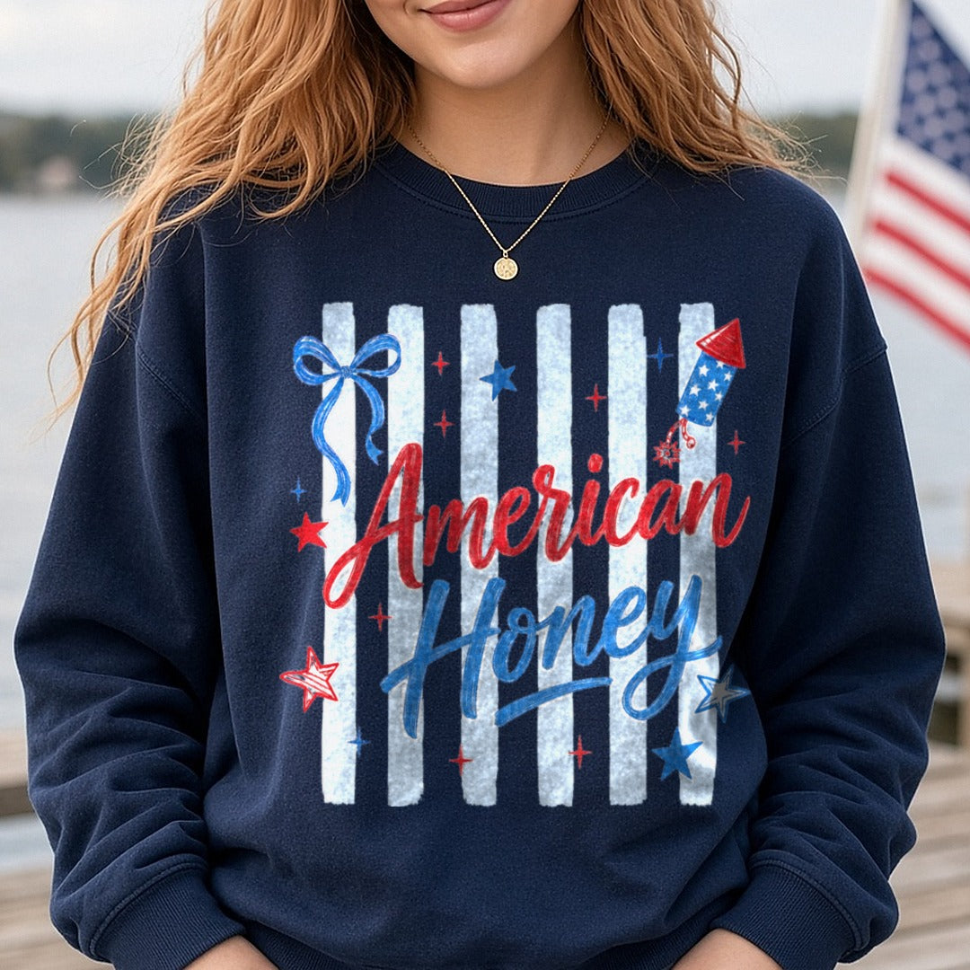 American Honey Patriotic Script with Stars Bow and Rocket DTF transfer shown on a Comfort Colors sweatshirt