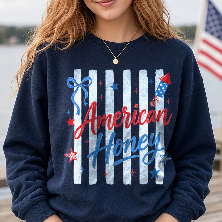 American Honey Patriotic Script with Stars Bow and Rocket DTF transfer shown on a Comfort Colors sweatshirt