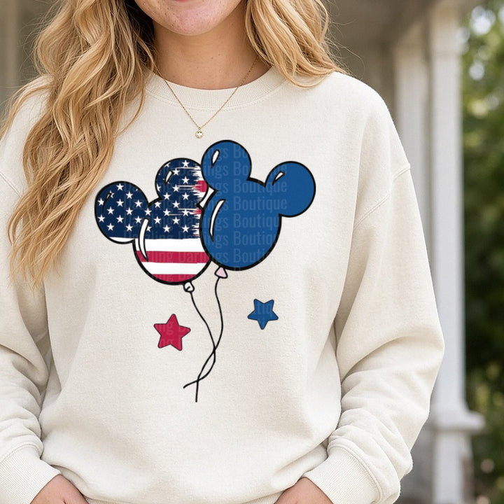 Patriotic Mickey Mouse American Flag Balloons Stars DTF transfer shown on a Comfort Colors sweatshirt