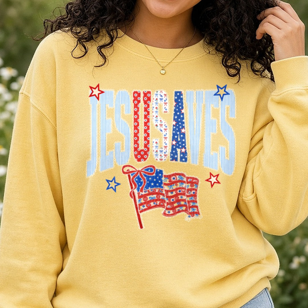 Jesus Loves USA Patriotic Floral Flag Stars Design DTF transfer shown on a Comfort Colors sweatshirt