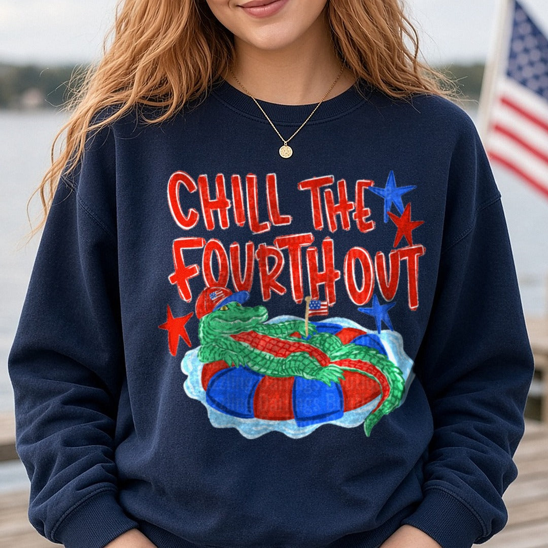 Chill The Fourth Out Patriotic Alligator Floating Pool Ring DTF transfer shown on a Comfort Colors sweatshirt