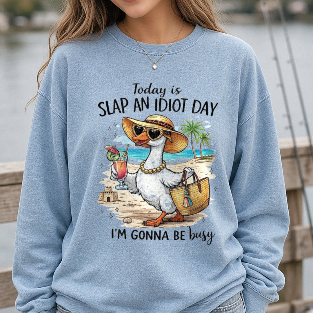 Today Is Slap An Idiot Day I'm Gonna Be Busy Beach Duck DTF transfer shown on a Comfort Colors sweatshirt