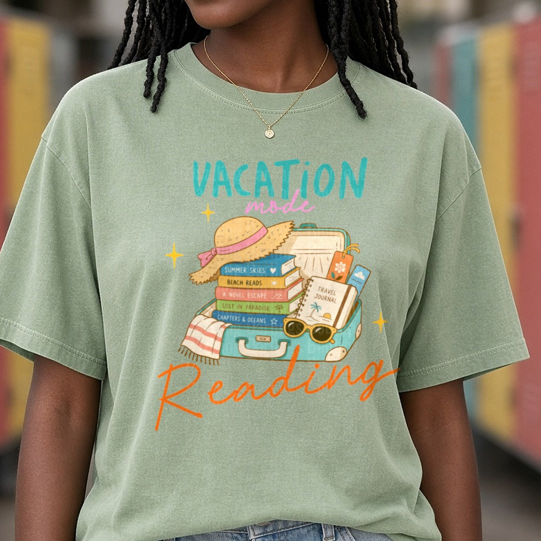 Vacation Mode Reading Open Suitcase Books Beach Hat DTF transfer shown on a Comfort Colors tee
