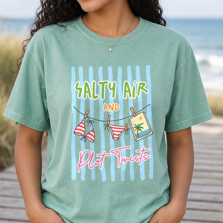 Salty Air and Plot Twists Bikini Clothesline Beach Book DTF transfer shown on a Comfort Colors tee