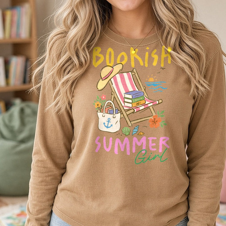 Bookish Summer Girl Beach Chair Books Tote Bag Ocean Scene DTF transfer shown on a Comfort Colors long sleeve tee
