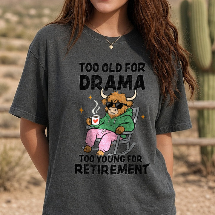 Too Old For Drama Too Young For Retirement Highland Cow DTF transfer shown on a Comfort Colors tee