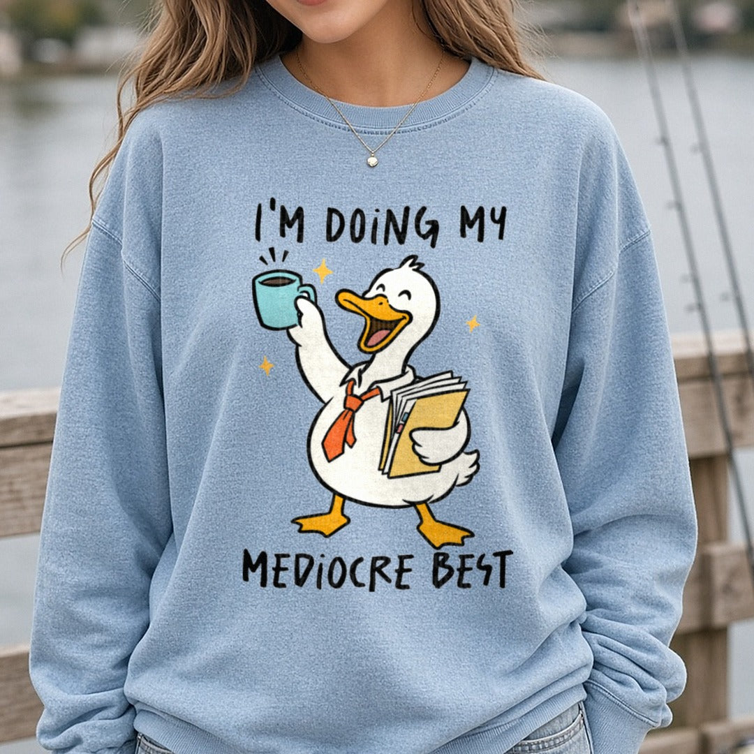 I'm Doing My Mediocre Best Funny Duck with Coffee DTF transfer shown on a Comfort Colors sweatshirt