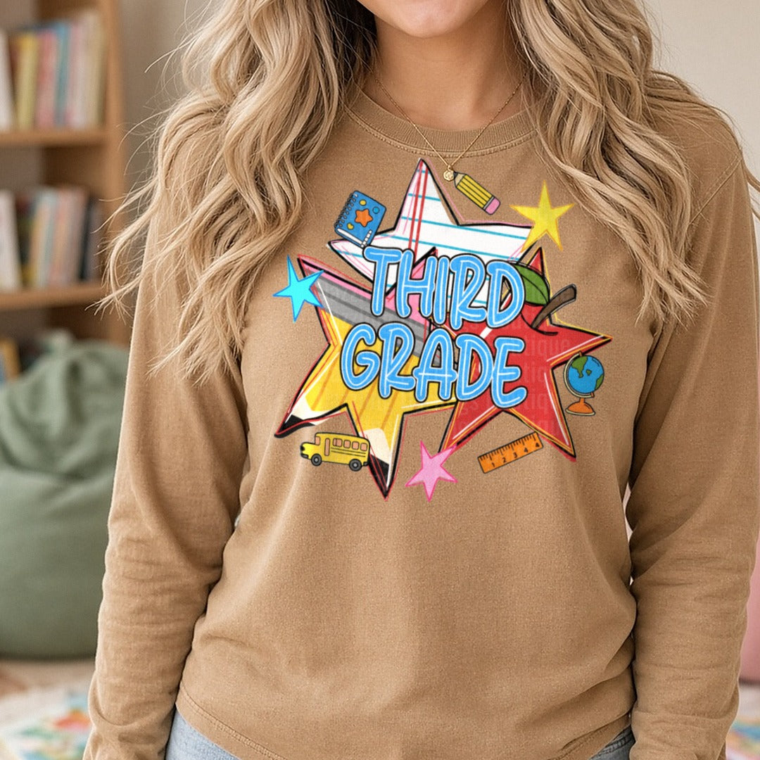 Third Grade Back to School Stars Colorful Teacher Design DTF transfer shown on a Comfort Colors long sleeve tee